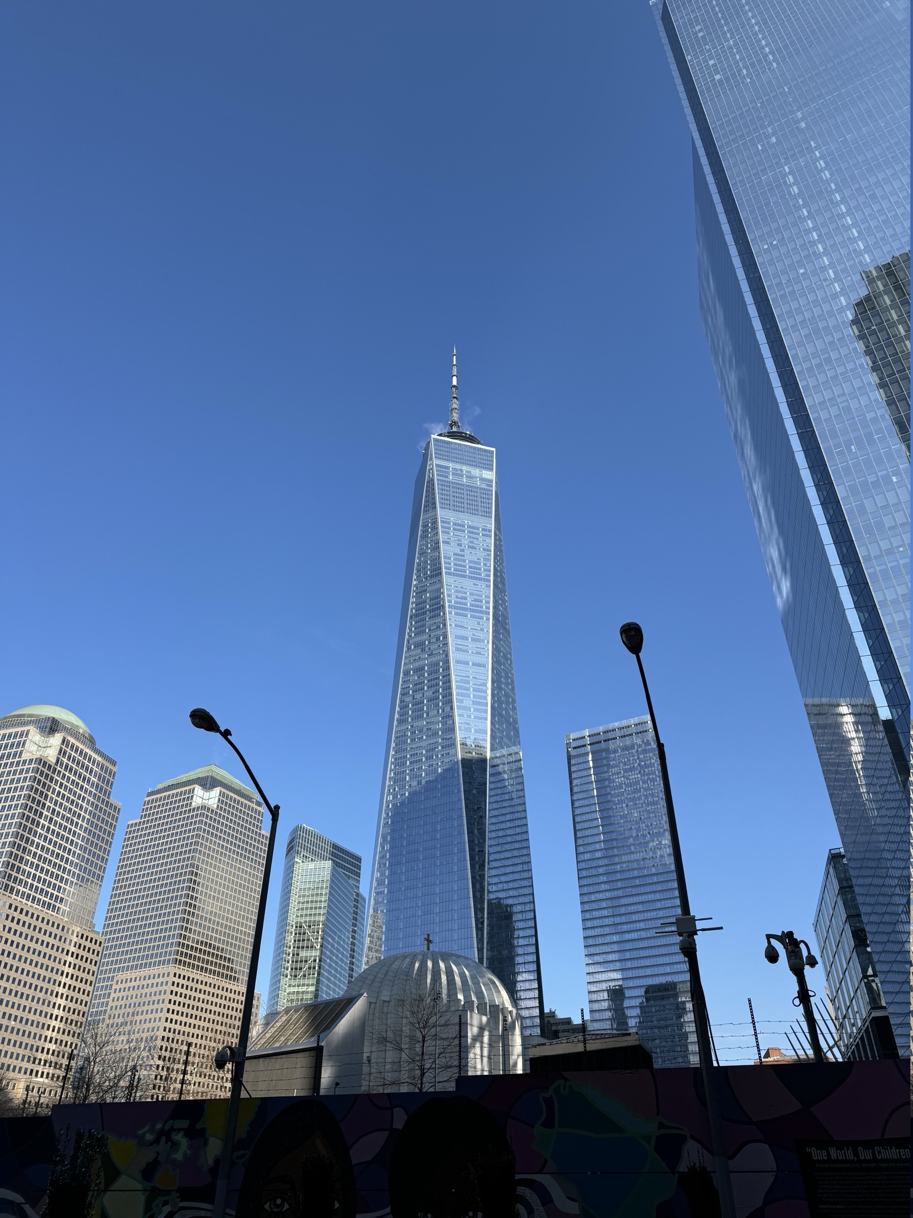 One World Trade Center rising into a clear blue January sky